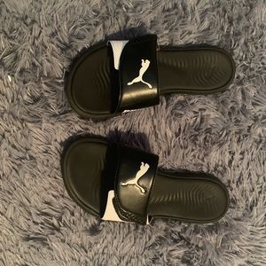 Black and white puma slides